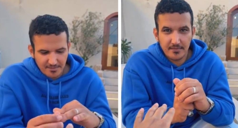 لسبب غريب.. شاهد: شاب سعودي يفشل في خلع خاتم الزواج من يده منذ 3 سنوات